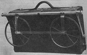 Walizka ze składanymi kółkami do transportu literatury